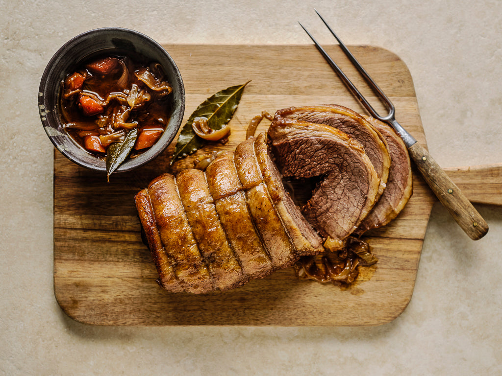 brisket slow cooked sicilian style with polenta (cooked dish)